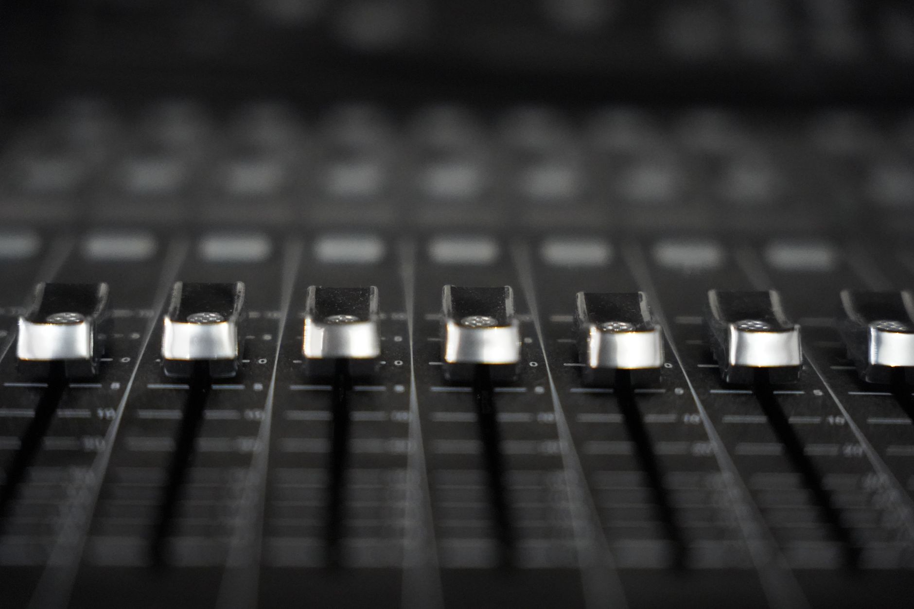 Audio mixing console faders