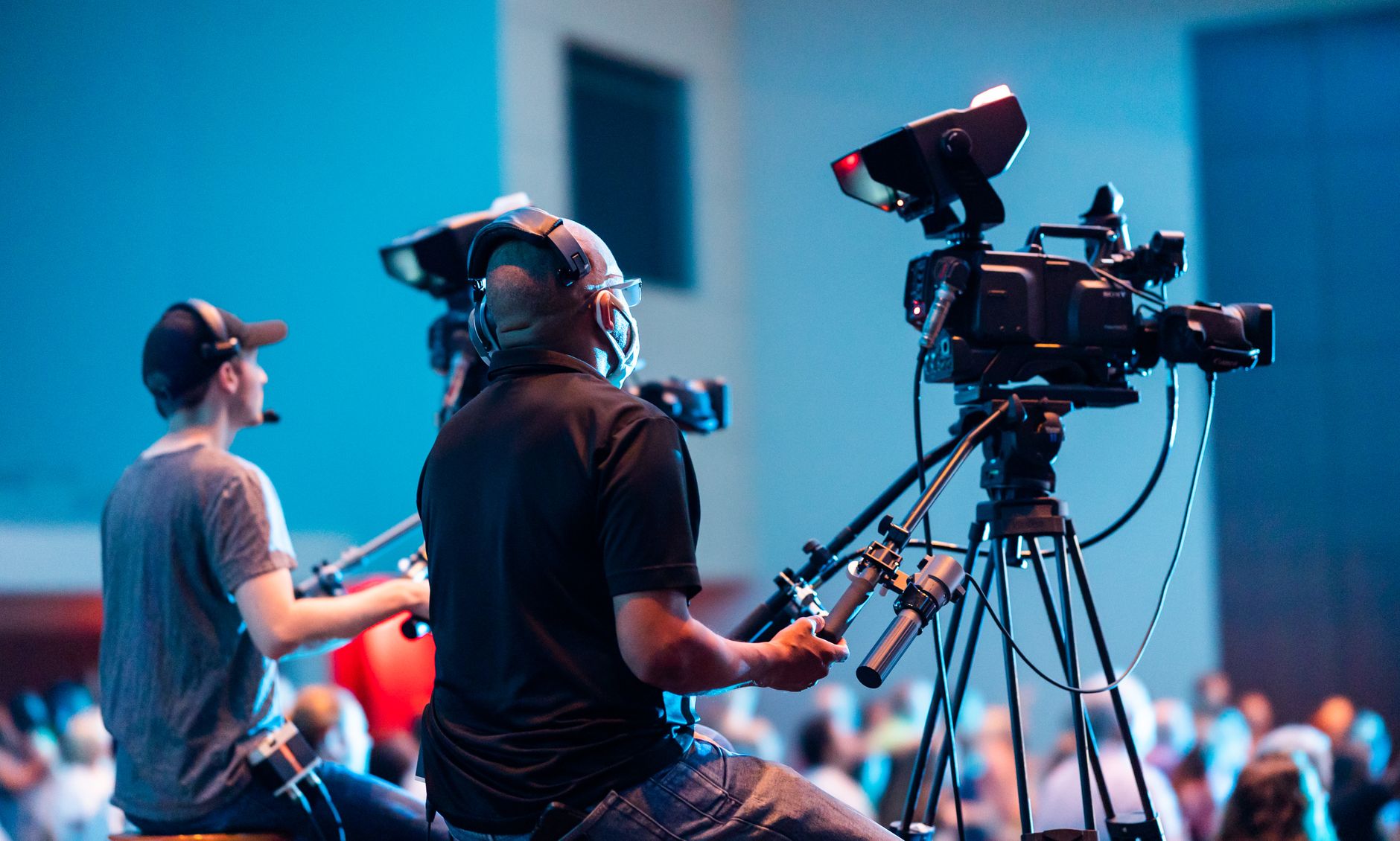 Camera operator filming action