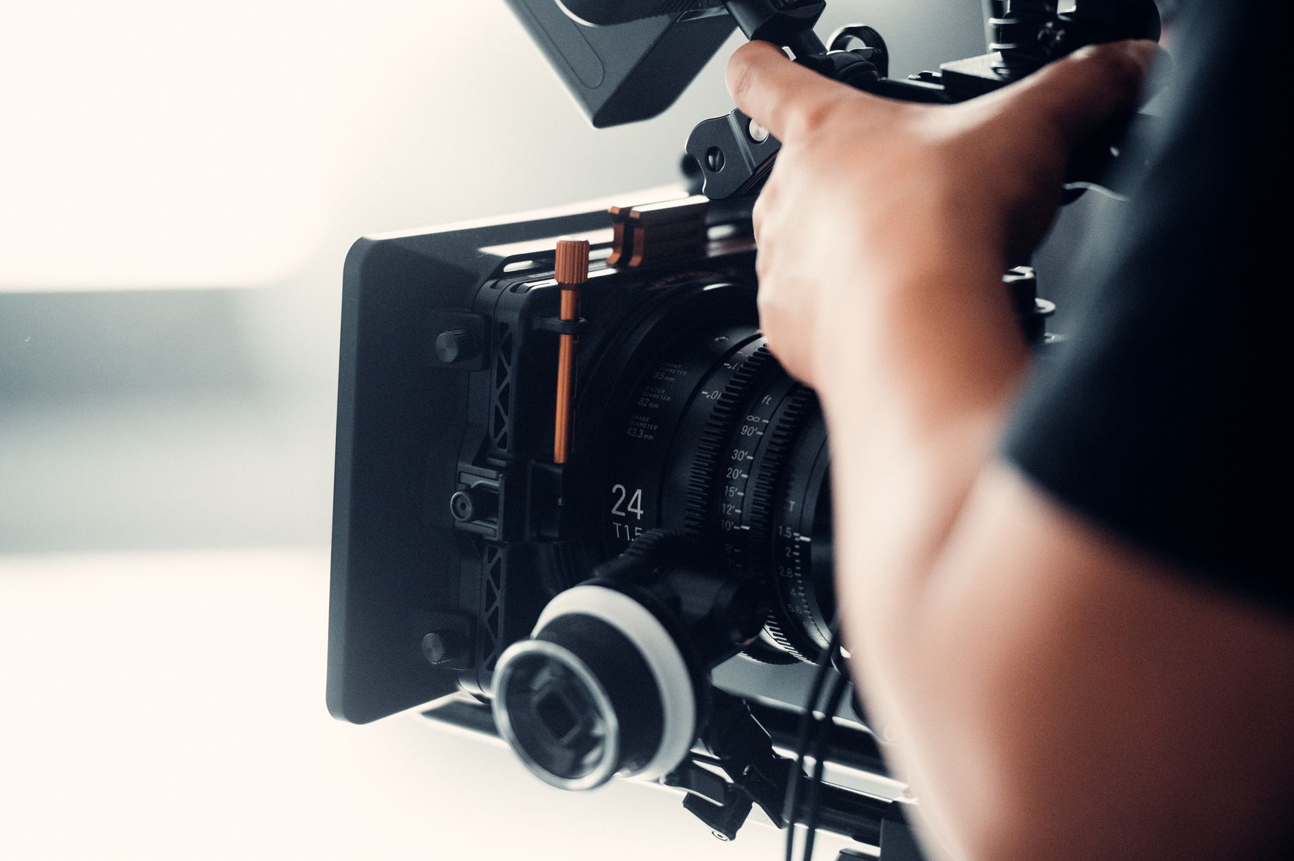 Camera operator filming closeup