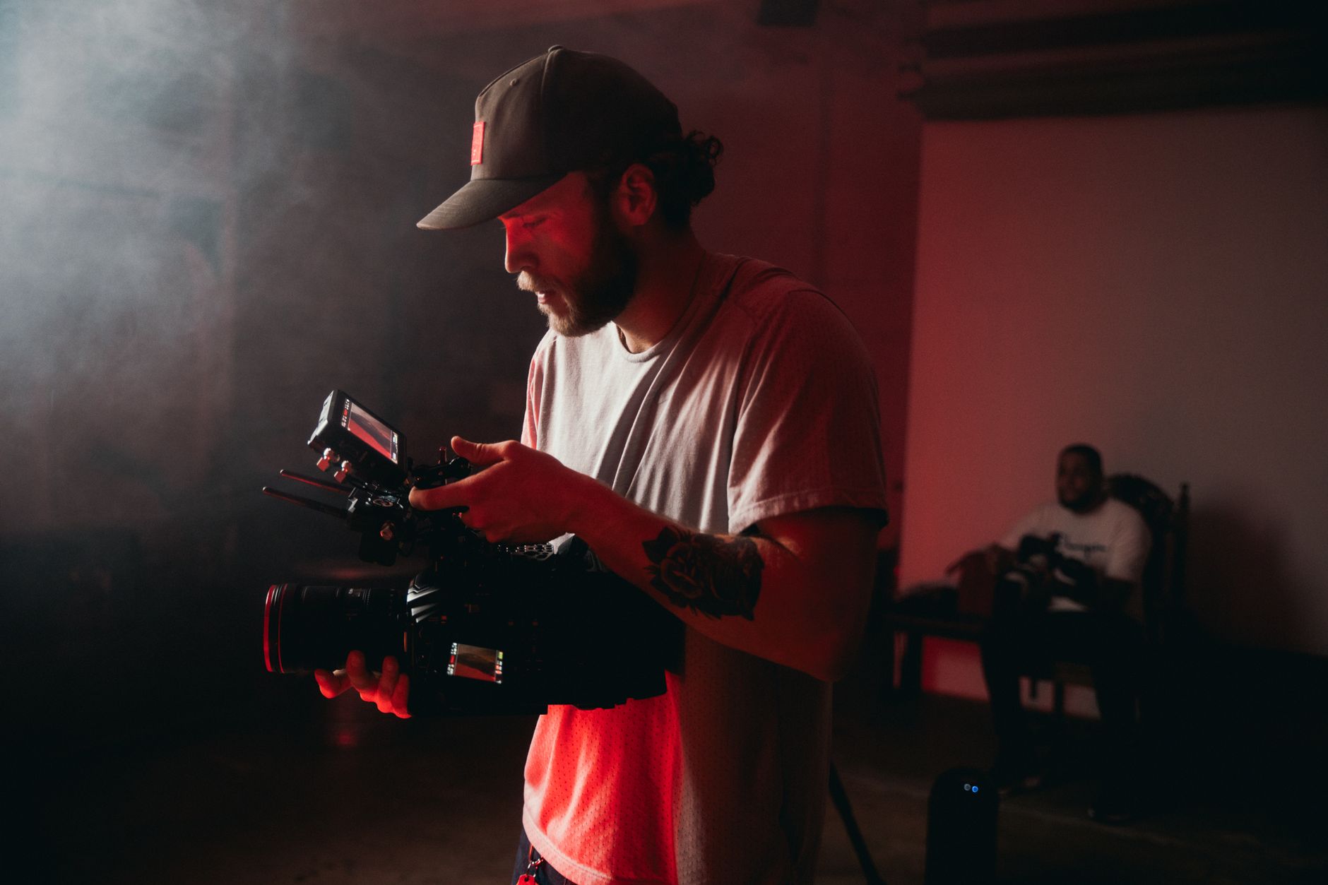 Filmmaker holding camera