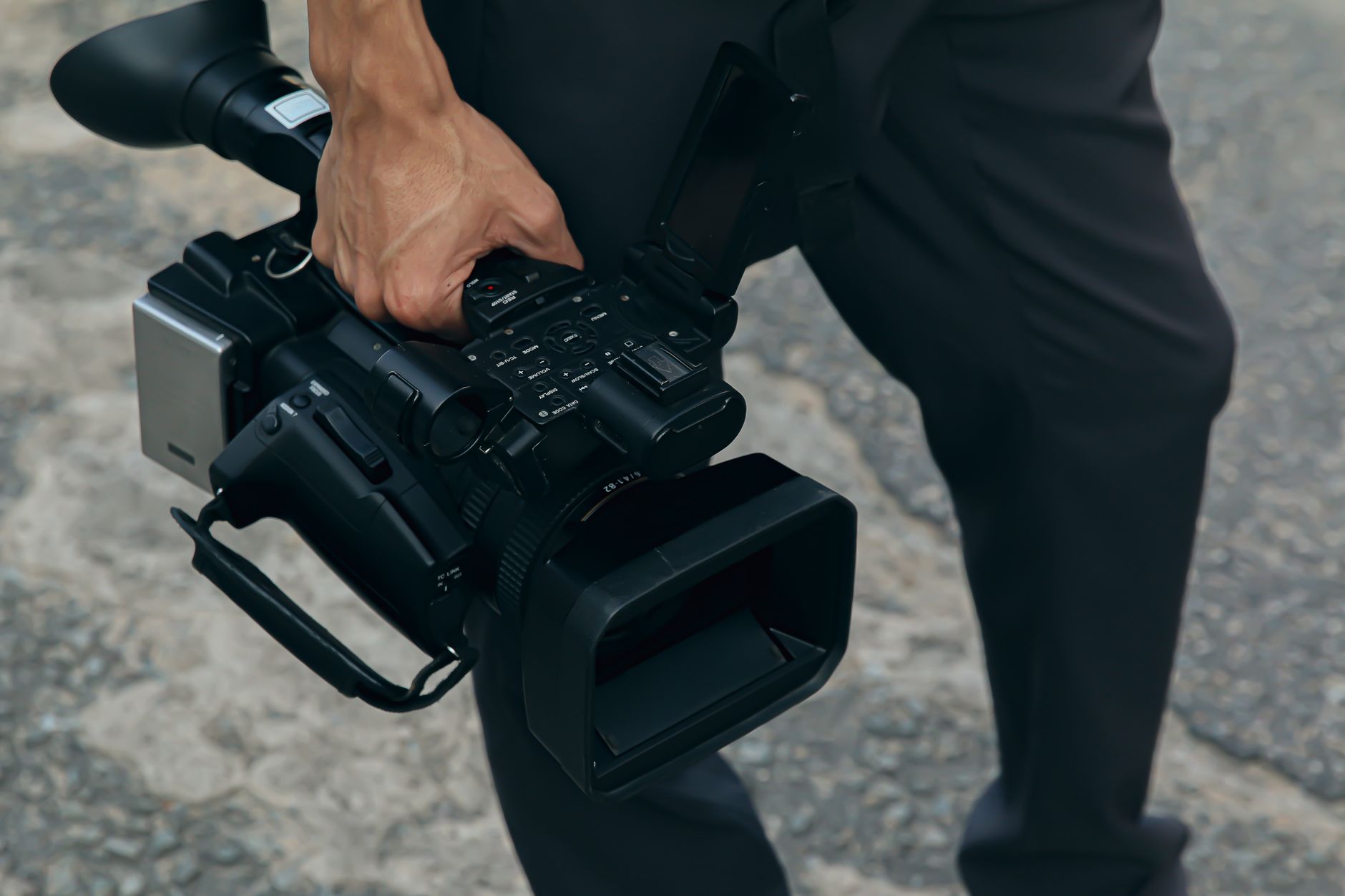 Handheld camera filming documentary