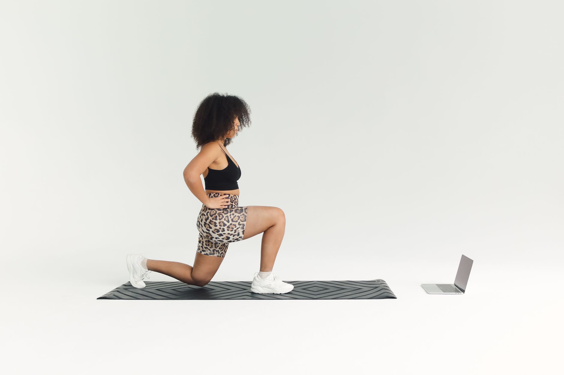 Person exercising fitness video