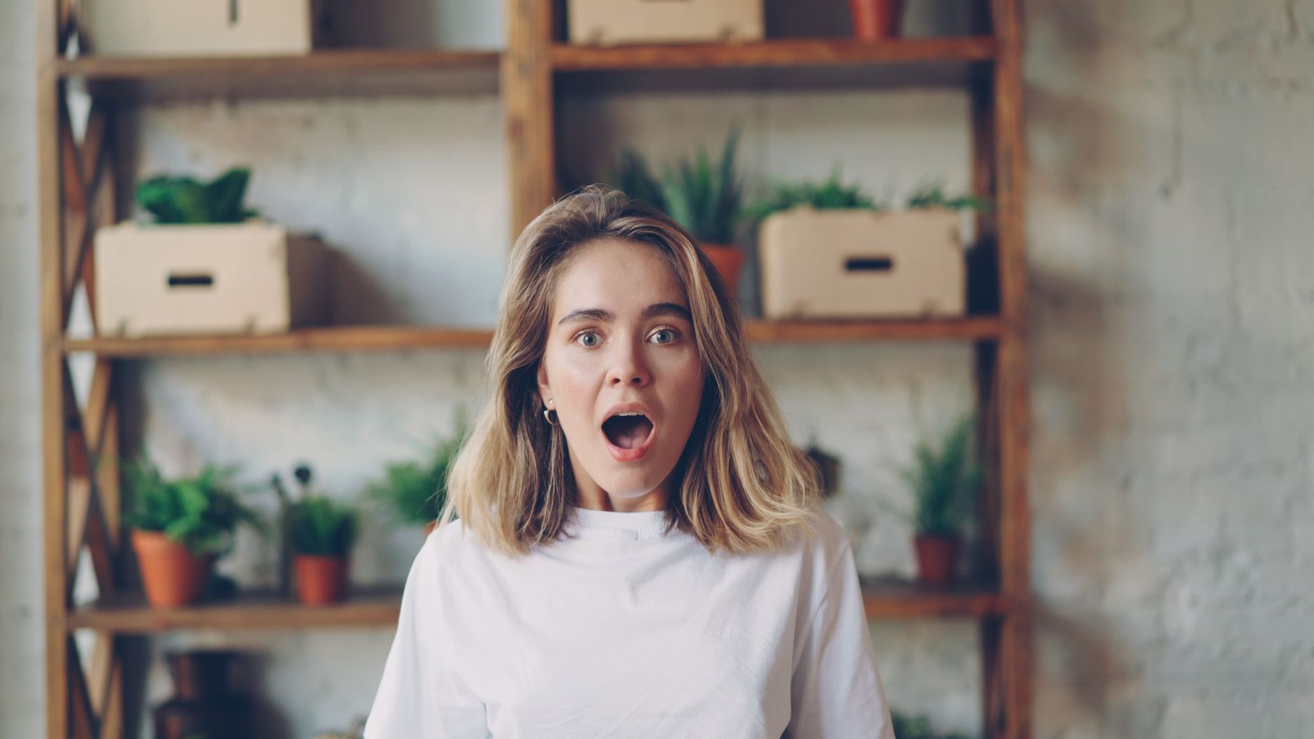 Person reacting surprised camera