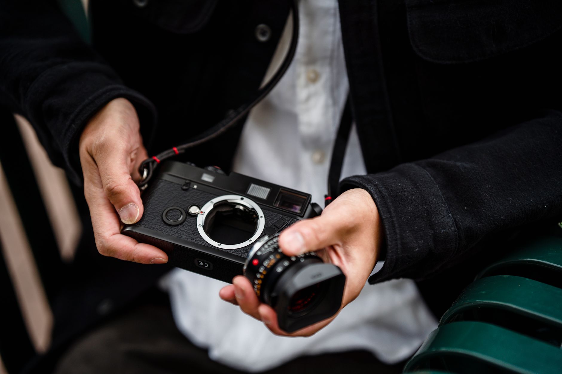 Photographer changing lens