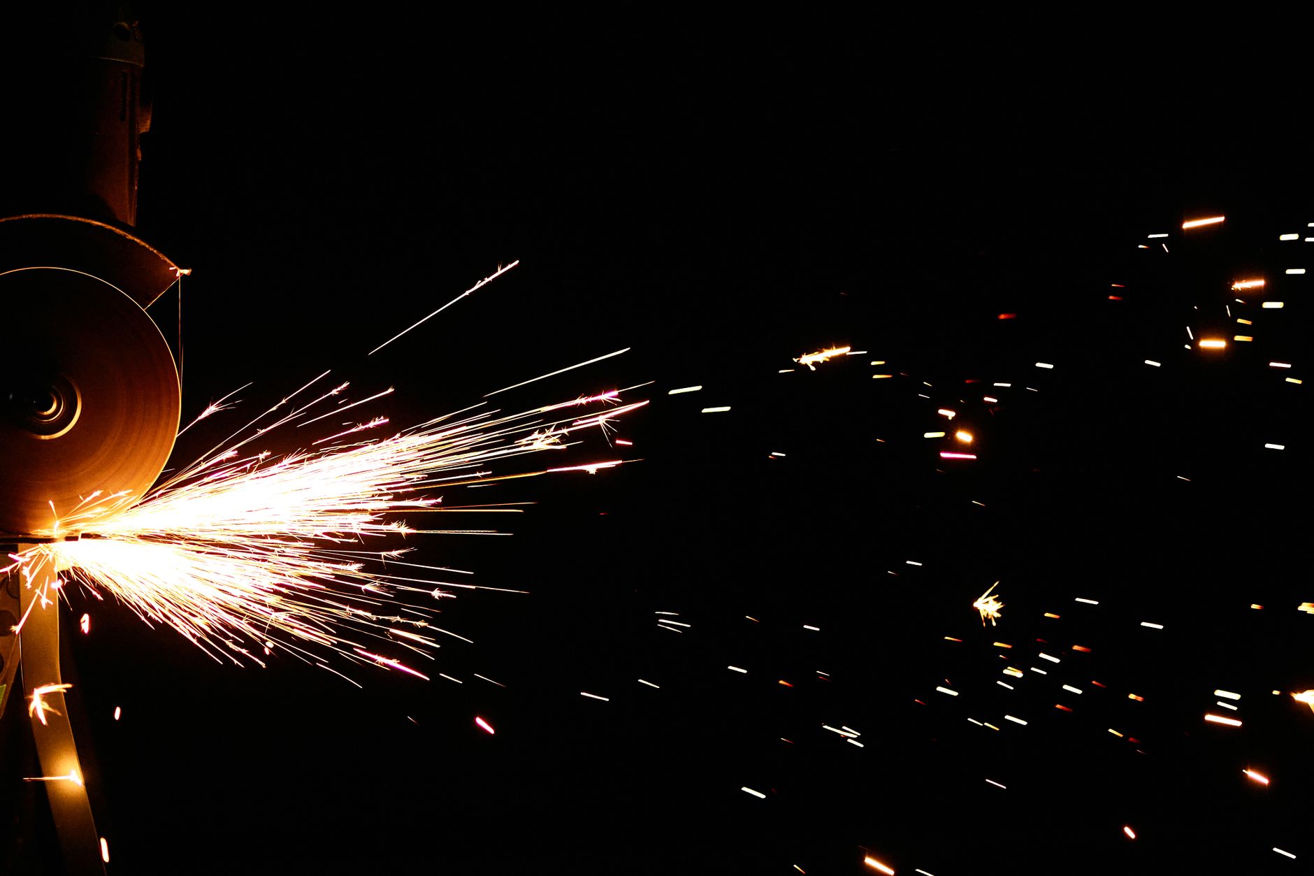 Sparks flying dark background